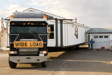 a wide-load mobile home transporter