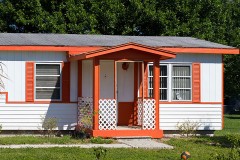 a mobile home with orange trim