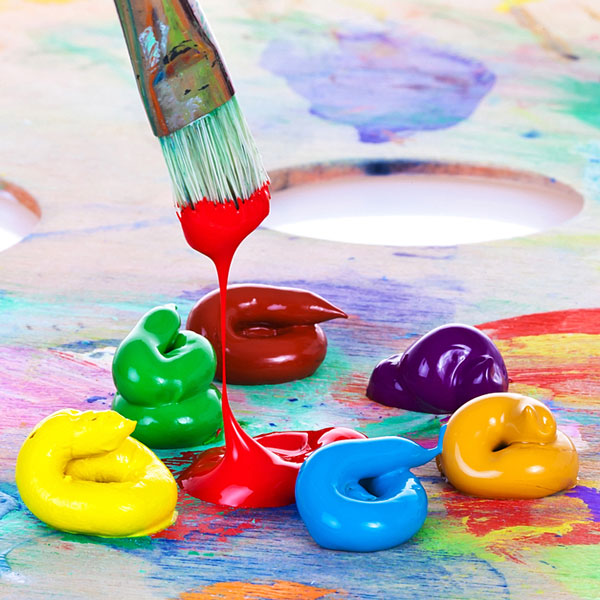 colorful oil paints and paintbrush (large image)