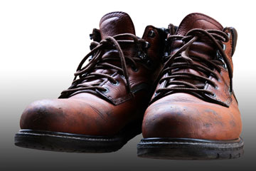 old, brown safety shoes
