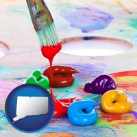 connecticut colorful oil paints and paintbrush
