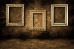 three gilded picture frames