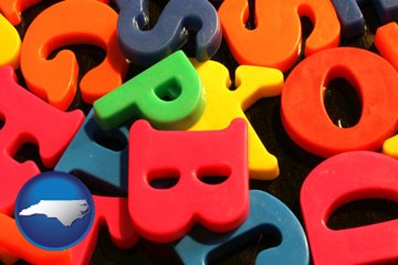 colorful plastic letters - with North Carolina icon