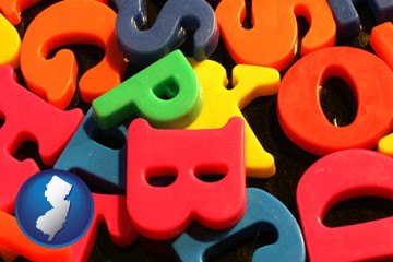 colorful plastic letters - with New Jersey icon