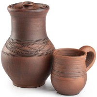a brown clay pottery jar and cup
