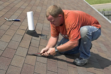 a roofing project contractor and equipment