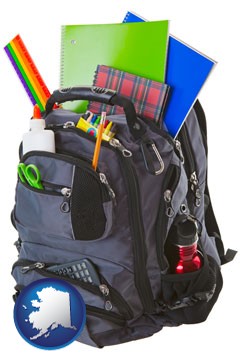 a backpack filled with school supplies - with Alaska icon