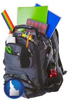 a backpack filled with school supplies - with Idaho icon