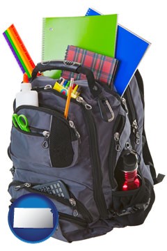 a backpack filled with school supplies - with Kansas icon
