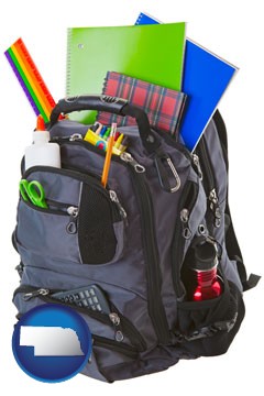 a backpack filled with school supplies - with Nebraska icon