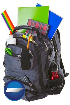 a backpack filled with school supplies - with Tennessee icon