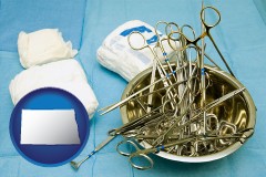 north-dakota map icon and surgical instruments and bandages