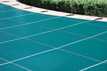 a teal swimming pool cover
