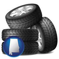 al map icon and four tires with alloy wheels