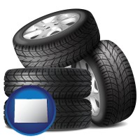 colorado map icon and four tires with alloy wheels