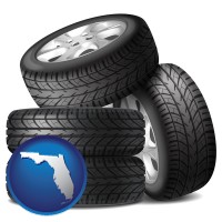 fl map icon and four tires with alloy wheels