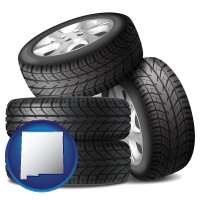 nm map icon and four tires with alloy wheels