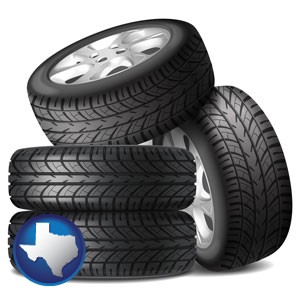 four tires with alloy wheels - with Texas icon