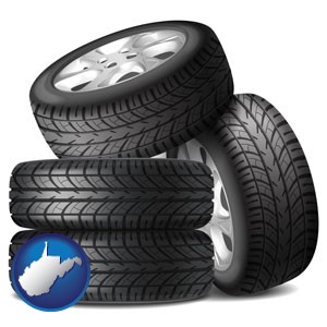 four tires with alloy wheels - with West Virginia icon