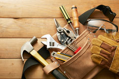 tools in a leather tool belt