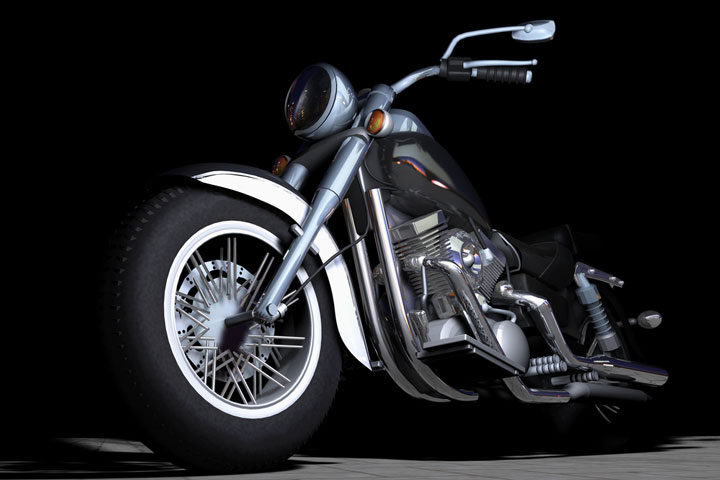 a vintage motorcycle on a black background (large image)