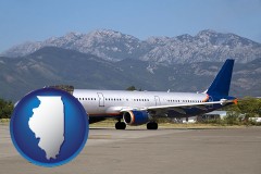 illinois map icon and commercial aircraft at an airport, with mountainous background