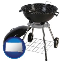south-dakota map icon and a kettle-style charcoal grill