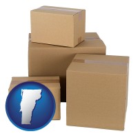 vermont map icon and a stack of cardboard boxes