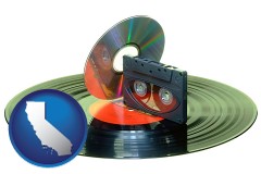 california map icon and an audio compact disc, a compact cassette, and a vinyl record