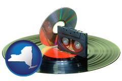 new-york map icon and an audio compact disc, a compact cassette, and a vinyl record