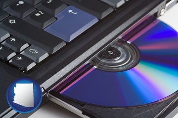 loading software into a laptop computer from a cd - with Arizona icon