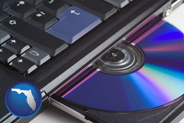 loading software into a laptop computer from a cd - with Florida icon