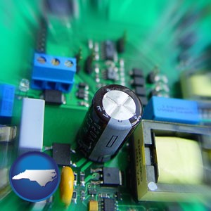 electronic components on a circuit board - with North Carolina icon