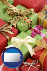 pennsylvania map icon and wrapped holiday gifts