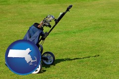 massachusetts map icon and a golf bag on a green fairway