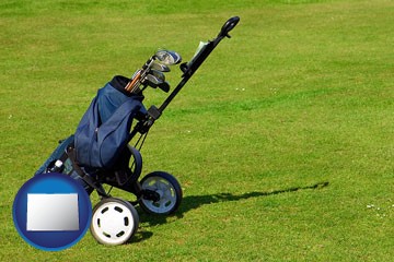 a golf bag on a green fairway - with Colorado icon