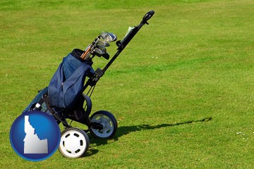 a golf bag on a green fairway - with Idaho icon