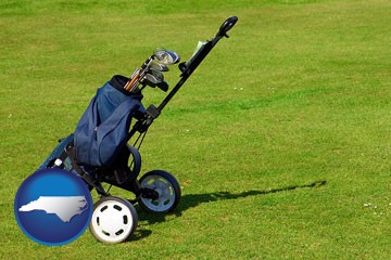 a golf bag on a green fairway - with North Carolina icon