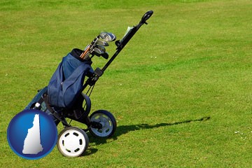 a golf bag on a green fairway - with New Hampshire icon