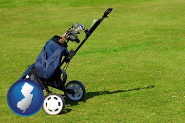 a golf bag on a green fairway - with New Jersey icon
