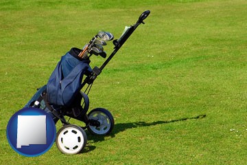 a golf bag on a green fairway - with New Mexico icon