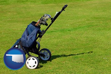 a golf bag on a green fairway - with Oklahoma icon