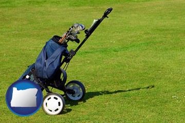a golf bag on a green fairway - with Oregon icon