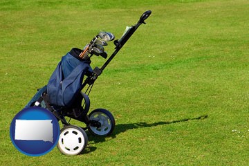 a golf bag on a green fairway - with South Dakota icon