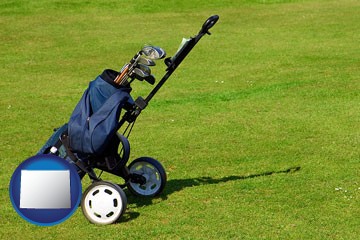 a golf bag on a green fairway - with Wyoming icon