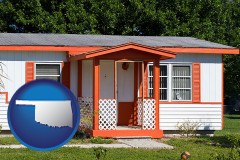 oklahoma map icon and a mobile home with orange trim