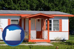 oregon map icon and a mobile home with orange trim