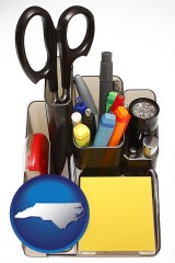 north-carolina map icon and office supplies
