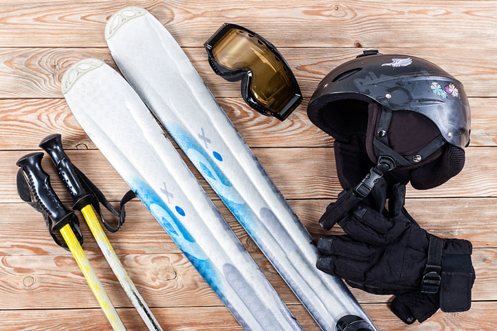 skis, ski poles, skiing gloves, goggles, and a helmet (large image)