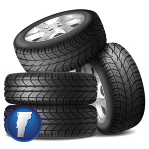 four tires with alloy wheels - with Vermont icon